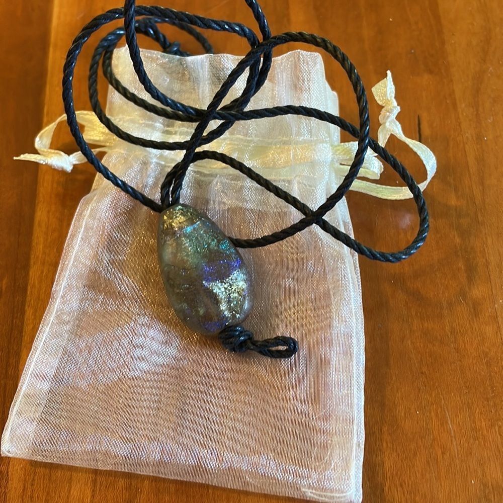 Fumed glass pendant on cord.